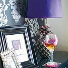 room with wallpaper photo frame lamp
