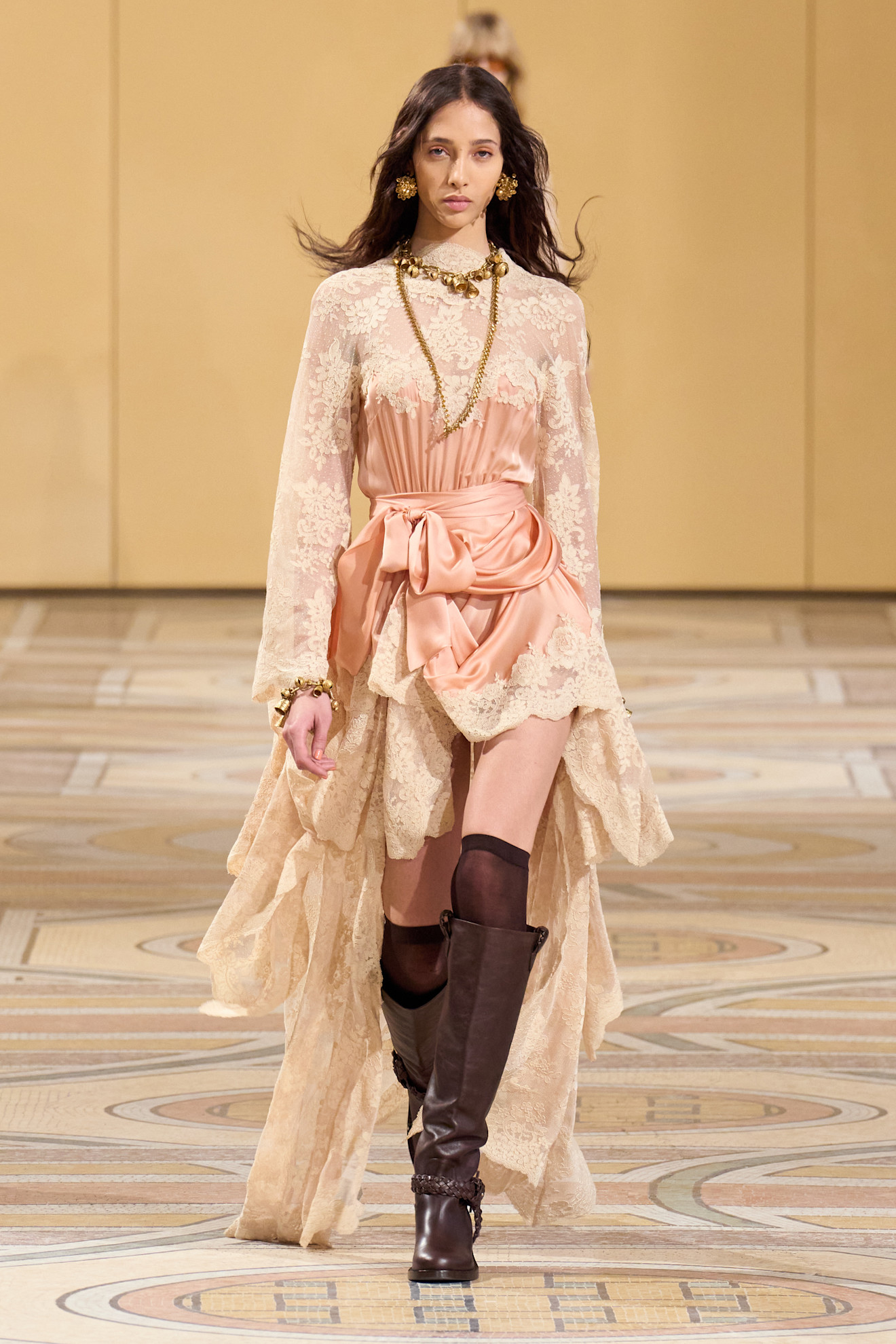 An image of slouchy boots on the Zimmermann autumn/winter 2025 runway.