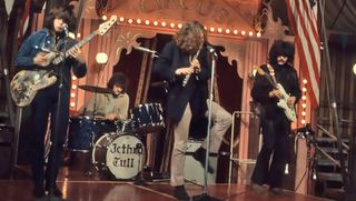 Jethro Tull performs on 11 December 1968 for the Rolling Stones' Rock and Roll Circus. Ian Anderson stands center, with guitarist Tony Iommi at the right of the photo. This was Iommi's sole performance with Tull before he returned to his band Earth, which would rename itself Black Sabbath and go on to global fame.