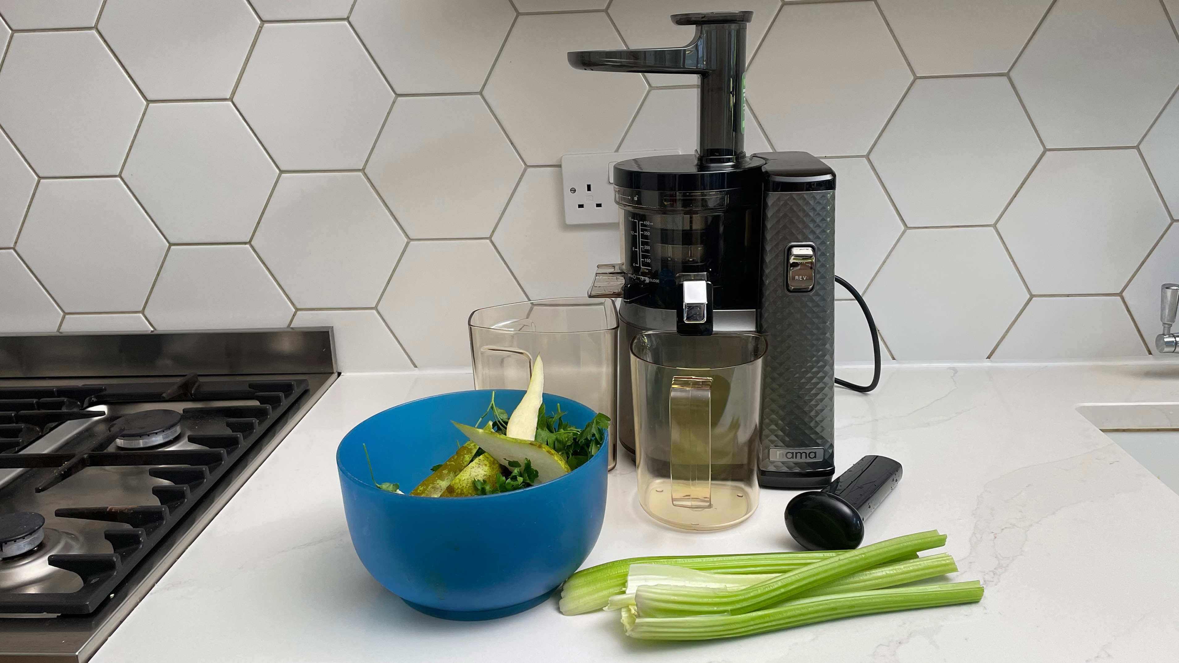 Nama Vitality 5800 on a kitchen countertop with green fruit and vegetables