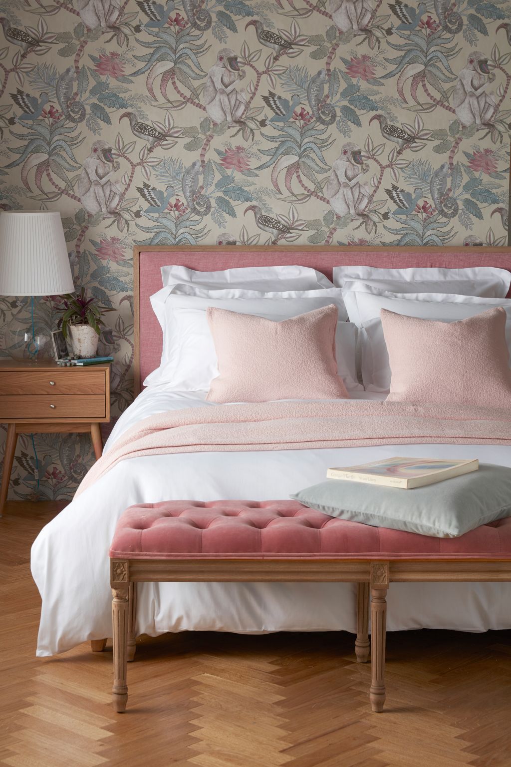 Pink bedroom idea with wallpaper