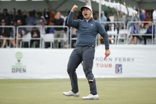 Rico Hoey celebrates a winning putt at the Knoxville Open