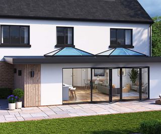 3D render of a large detached white-rendered house with a singles-storey extension with two large roof lanterns