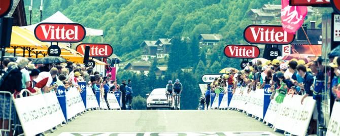 Ryder Hesjedal and David Millar cross the finish line together in 135th and 136th position after a tough day over the mountains.