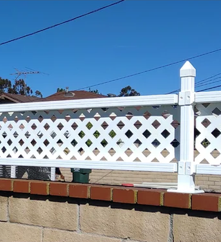 White lattice fence panel