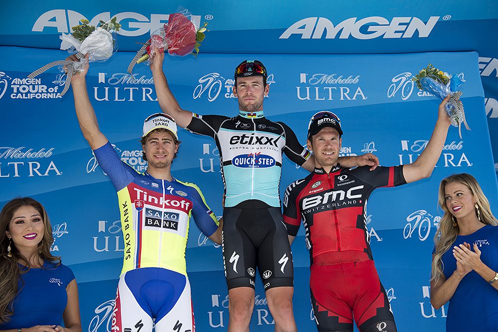 Mark Cavendish (Etixx-QuickStep) tops the stage 1 podium