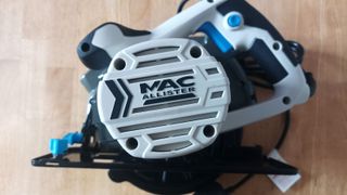 Close up of MacAllister logo on circular saw