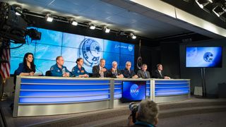 NASA and Boeing officials hold a post-launch briefing to discuss the anomaly that occurred after the CST-Starliner launched on Dec. 20, 2019. From left to right: NASA Associate Administrator for the Office of Communications Bettina Inclán, NASA astronauts Michael Fincke and Nicole Mann, NASA Administrator Jim Bridenstine, Tory Bruno, president and CEO of United Launch Alliance; Jim Chilton, senior vice president of Boeing’s Space and Launch Division; Steve Stich, Deputy Manager of NASA’s Commercial Crew Program; NASA ISS Program Manager Kirk Shireman