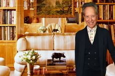 A comp image of a living room with a striped sofa and decorated book shelves, with an insert of Richard E Grant (R)
