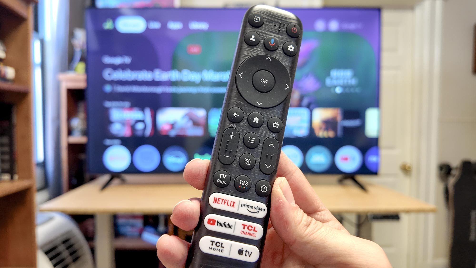 TCL S4 S-Class 4K TV (65S450G) remote shown held in hand