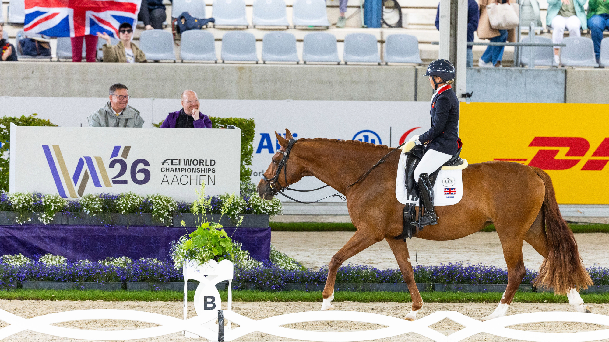 Sophie Wells rides MSJ Gold Standard out of the arena in walk on a long rein after her test at the 2026 World Para Dressage Championships in Aachen