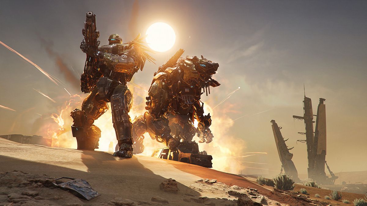 Still from the sci-fi video game Steel Hunters. There are two giant and armed mechs looking cool as they walk away from an explosion. They are on a barren sandy planet.