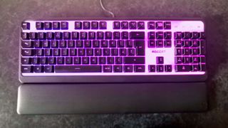 Roccat Magma lit up purple, top down view