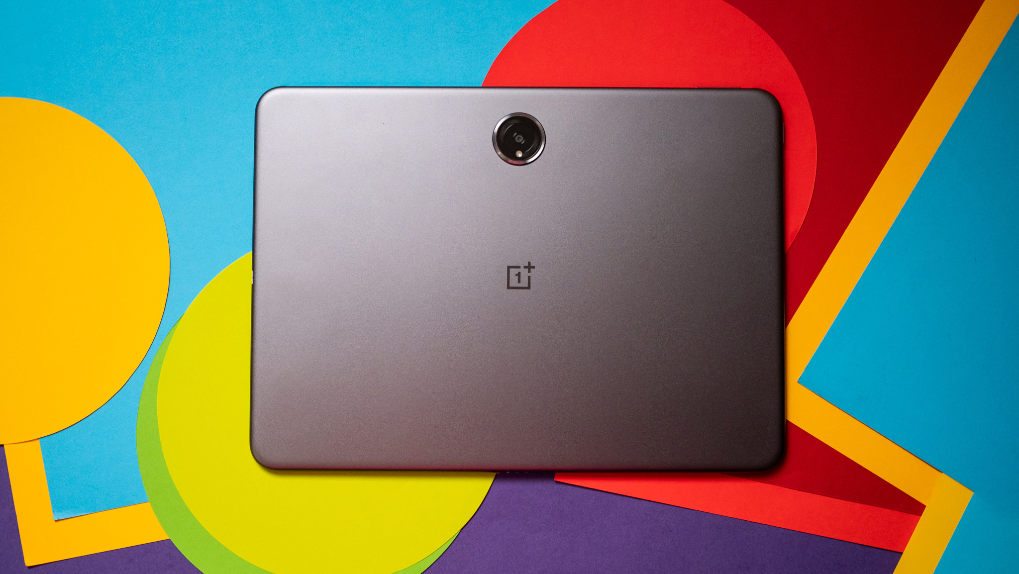 OnePlus Pad 2 tablet against colorful background