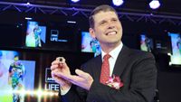 Rory Read, chief executive officer of Advanced Micro Devices Inc., poses with the company's E-Series (APU) during a news conference in Taipei, Taiwan, on Wednesday, June 6, 2012.
