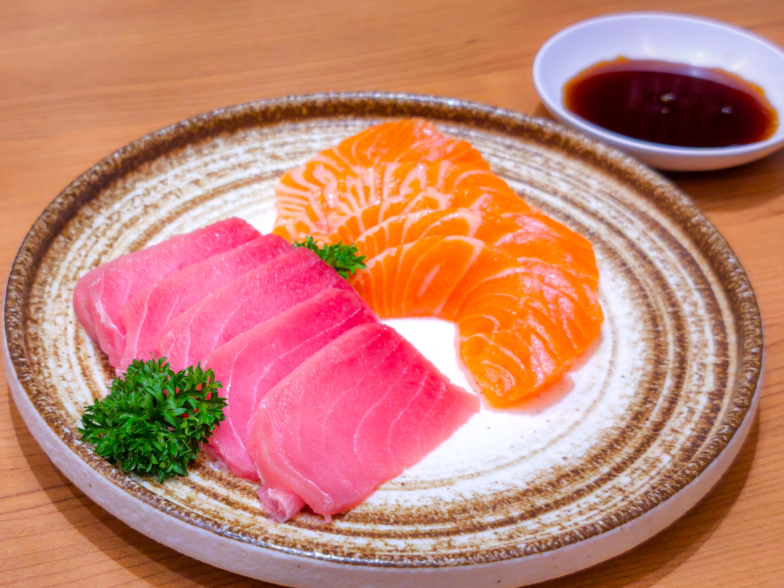 A plate of salmon and tuna sashimi