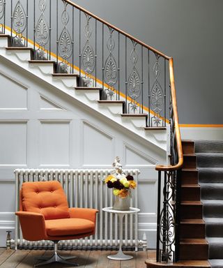 Creative director at Little Greene shares her favorite shade of gray, popular shade of gray near stairs in a hallway