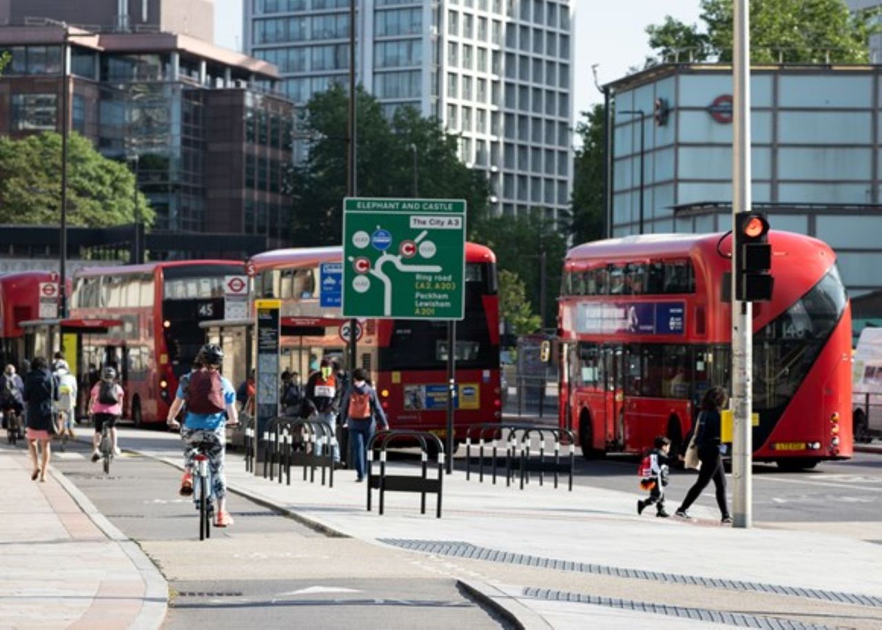 Cyclist and bus on London street