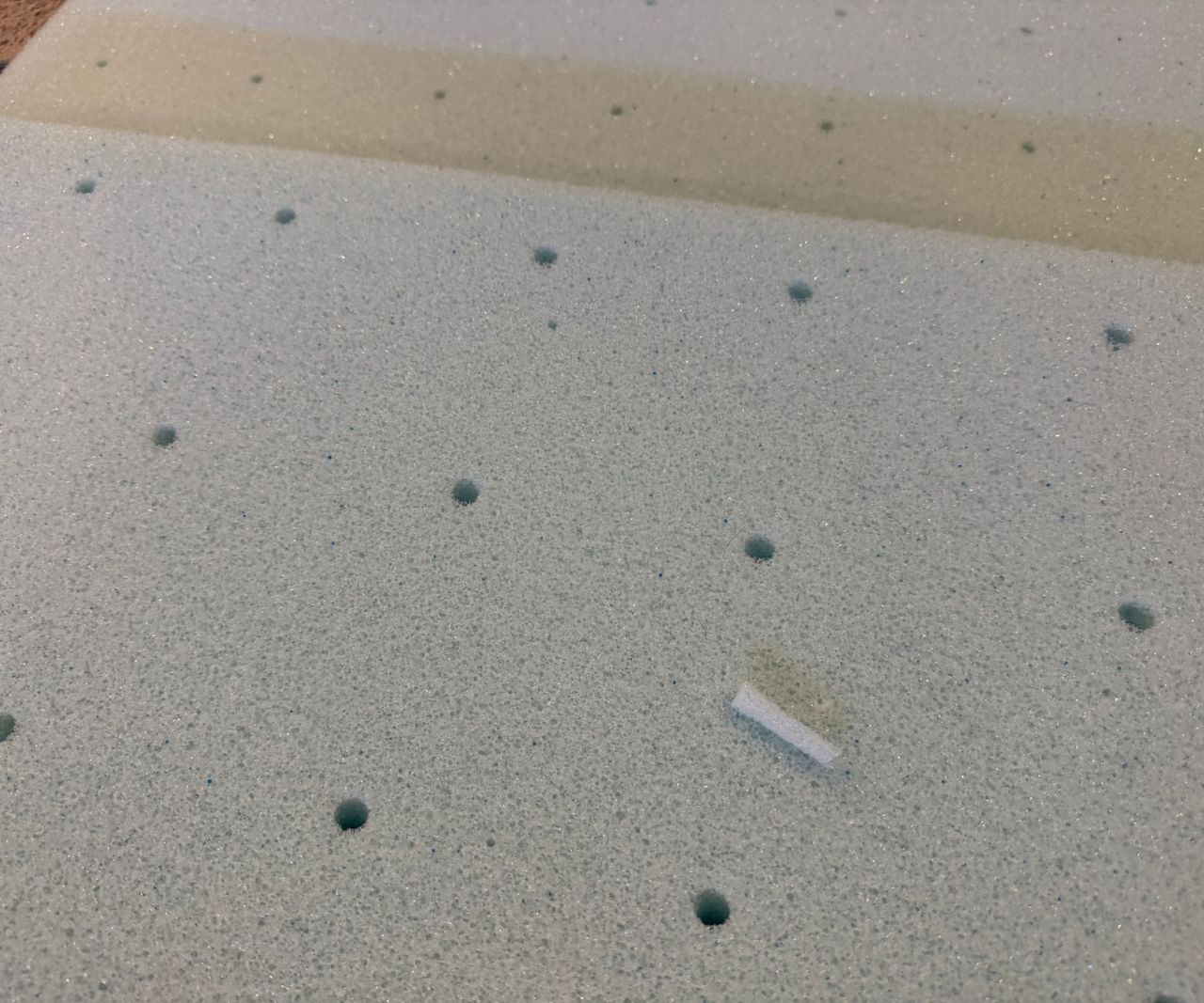 Lucid mattress topper being unboxed and tested for a review