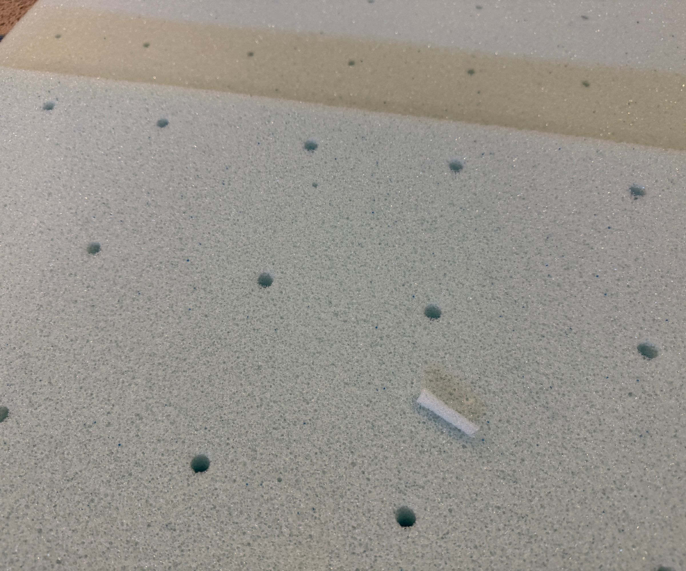 Lucid mattress topper being unboxed and tested for a review