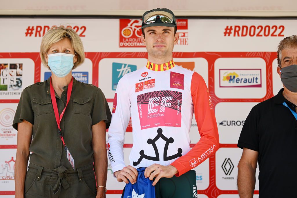 LES ANGLES FRANCE JUNE 18 Simon Carr of United Kingdom and Team EF Education Easypost celebrates winning the Occitanie Jersey winner on the podium ceremony after the 46th La Route dOccitanie La Depeche du Midi 2022 Stage 3 a 1887km stage from Sigean to Les Angles 1841m RDO2022 on June 18 2022 in Les Angles France Photo by Dario BelingheriGetty Images