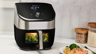 What are the 6-in-1 functionalities of the Instant Vortex Plus 6-Quart Air  Fryer Oven?