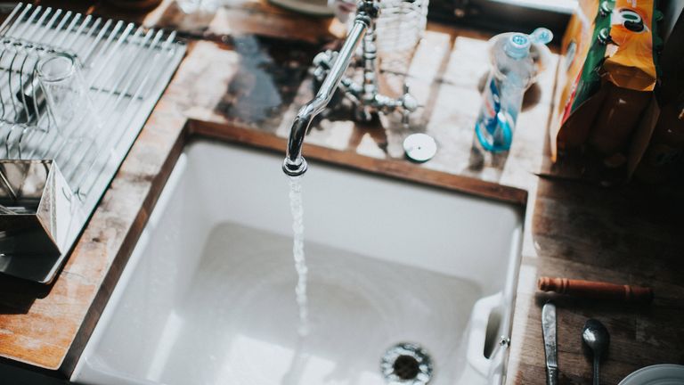 a sink with running water, how to unblock a sink