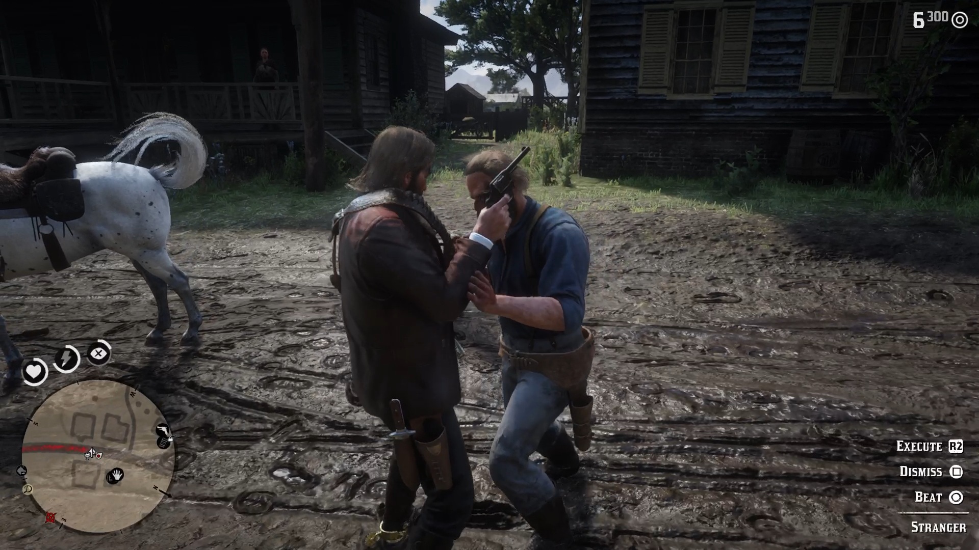 Red Dead Redemption 2 screenshot of Arthur Morgan hitting a man in the face with his pistol