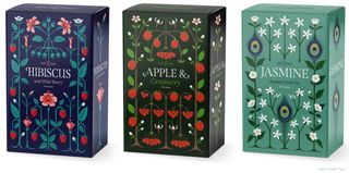 Three tea boxes adorned with geometric flower patterns