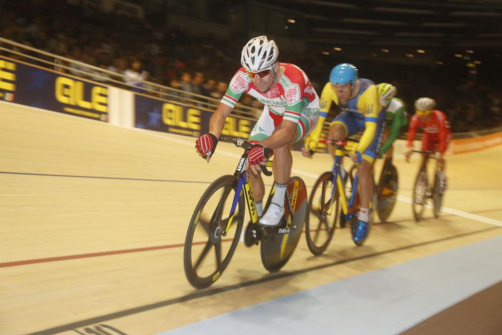 Kristin Lodassy (Hungary) rides in the men's scratch race