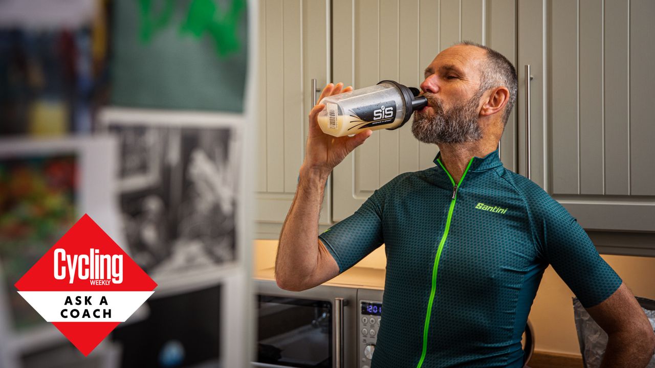 Male cyclist drinking a recovery drink