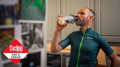 Male cyclist drinking a recovery drink