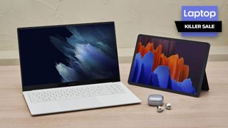 Samsung Galaxy Book Pro laptop, Galaxy Tab S7 and Galaxy Buds Pro on a wooden table