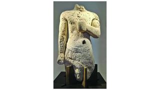 The sandstone statue of a god found in the Marsala Lagoon in 1933.