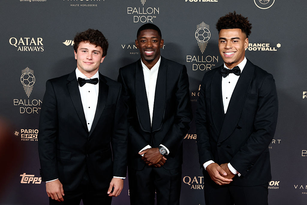 (LtoR) Paris Saint-Germain&#039;s Portuguese midfielder Joao Neves, Paris Saint-Germain&#039;s French forward Ousmane Dembele and Paris Saint-Germain&#039;s French midfielder Desire Doue pose upon arrival before the 2025 Ballon d&#039;Or France Football award ceremony at the Theatre du Chatelet in Paris on September 22, 2025.