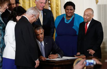 Obama signs executive order to protect LGBT Americans