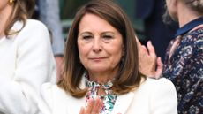 Carole Middleton wears a white blazer on day four of the Wimbledon Tennis Championships at the All England Lawn Tennis and Croquet Club on July 04, 2024