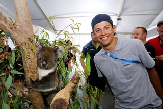 Say cheese. Esteban Chaves gets his photo taken with a chilled looking koala