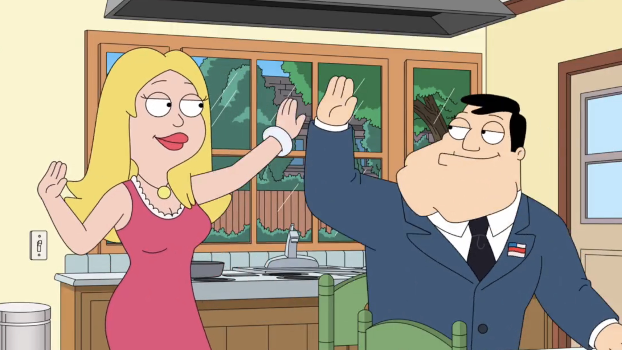 Stan and Francine High-fiving in the kitchen in American Dad