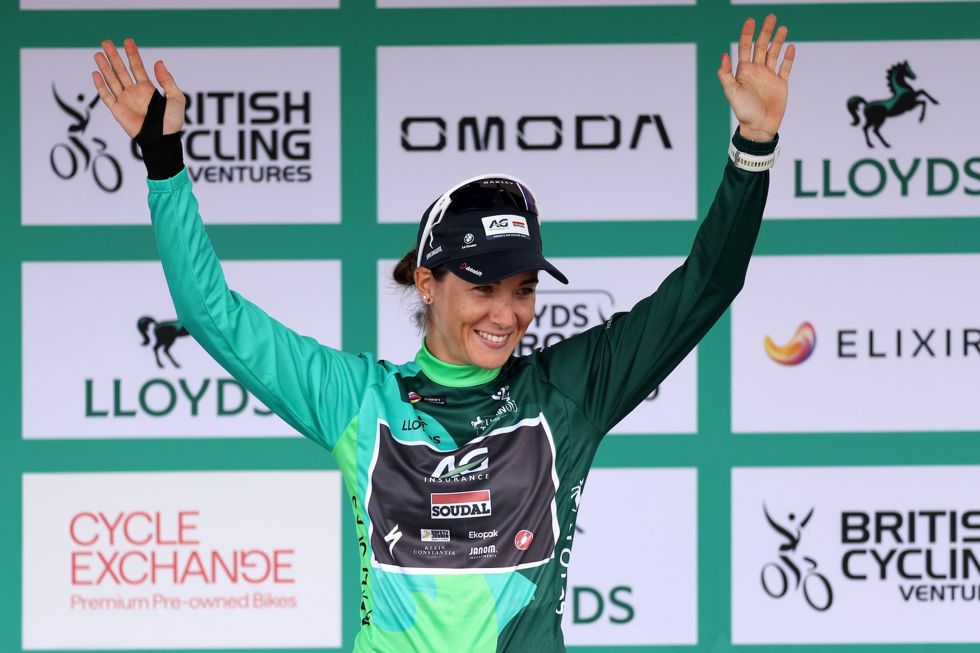 Kim Le Court-Pienaar of Mauritius and Team AG Insurance - Soudal Team celebrates at podium as - Green Leader Jersey winner