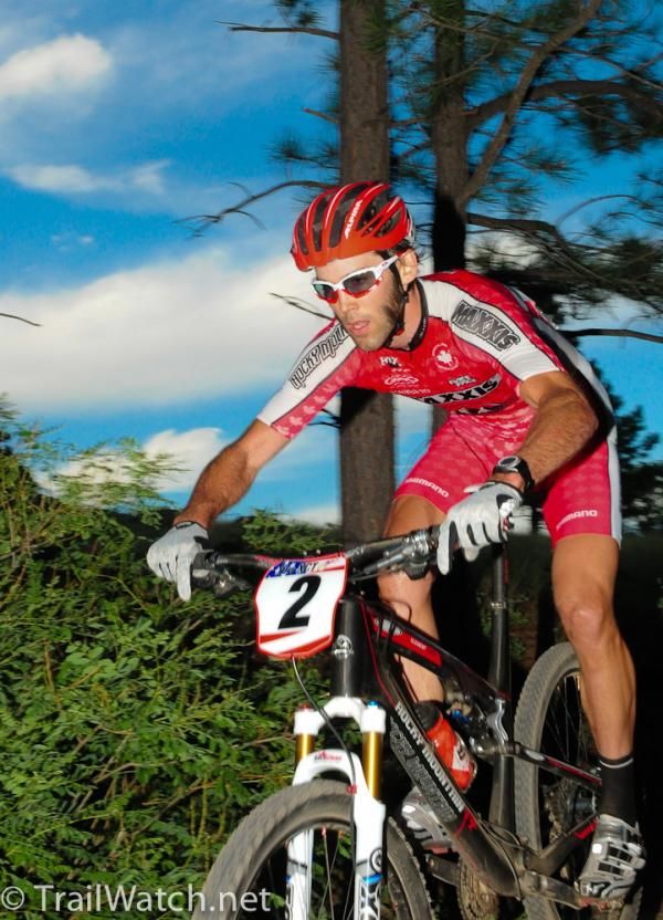 Geoff Kabush (Team Maxxis-Rocky Mountain) chases JHK (Subaru/Trek) after banging his head against a tree on lap one
