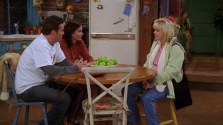 Chandler, Monica, and Erica talking on Friends.