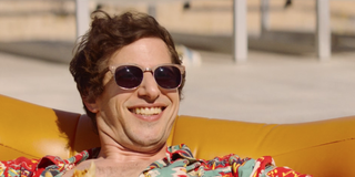Andy Samberg smiling in Palm Springs