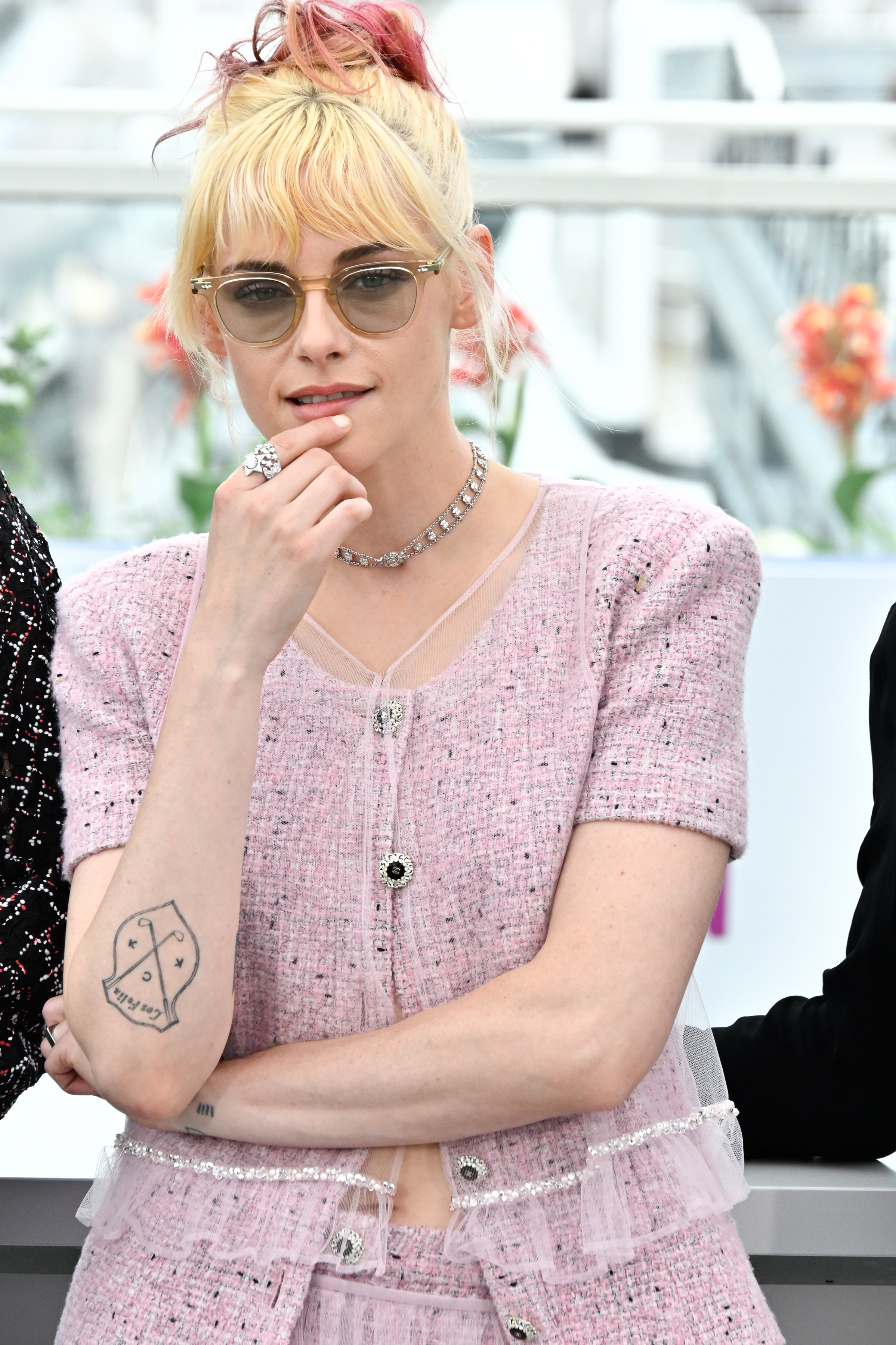 Kristen Stewart wearing a sheer pink skirt during "The Chronology of Water" photocall at the 78th annual Cannes Film Festival at Palais des Festivals