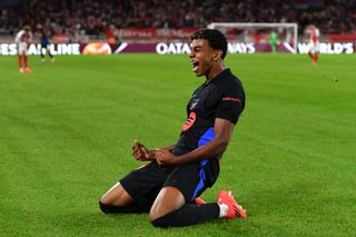 Lamine Yamal of FC Barcelona celebrates scoring his team's first goal during the UEFA Champions League 2024/25 League Phase MD1 match between AS Monaco and FC Barcelona at Stade Louis II on September 19, 2024 in Monaco, Monaco.