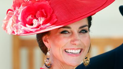 Kate Middleton in a red hat and dress at Royal Ascot