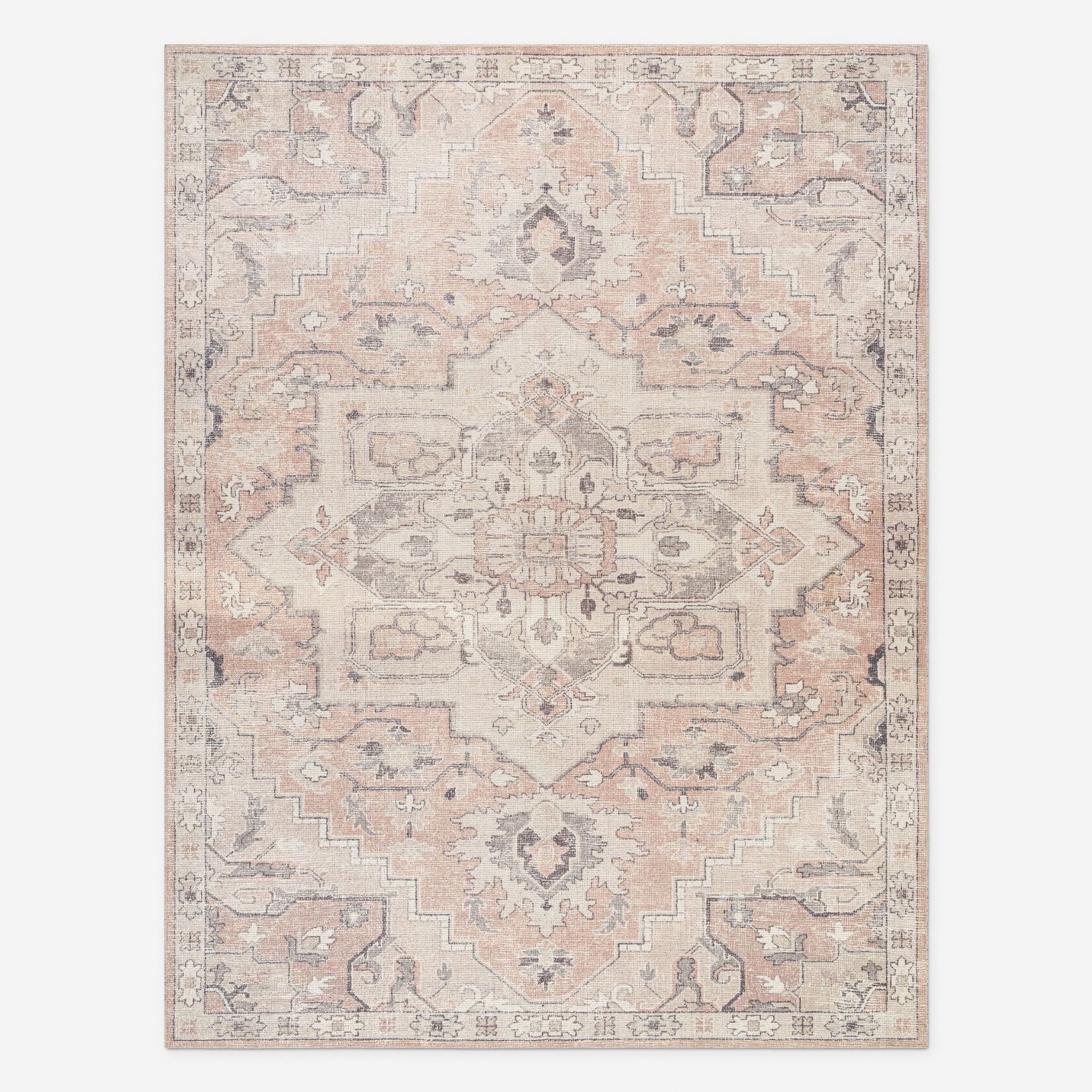 traditional patterned light pink rug