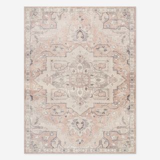 traditional patterned light pink rug