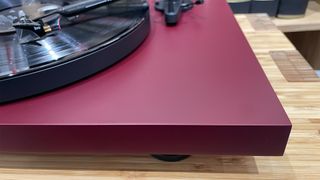 Pro-Ject Debut Evo 2 turntable close-up of corner of plinth