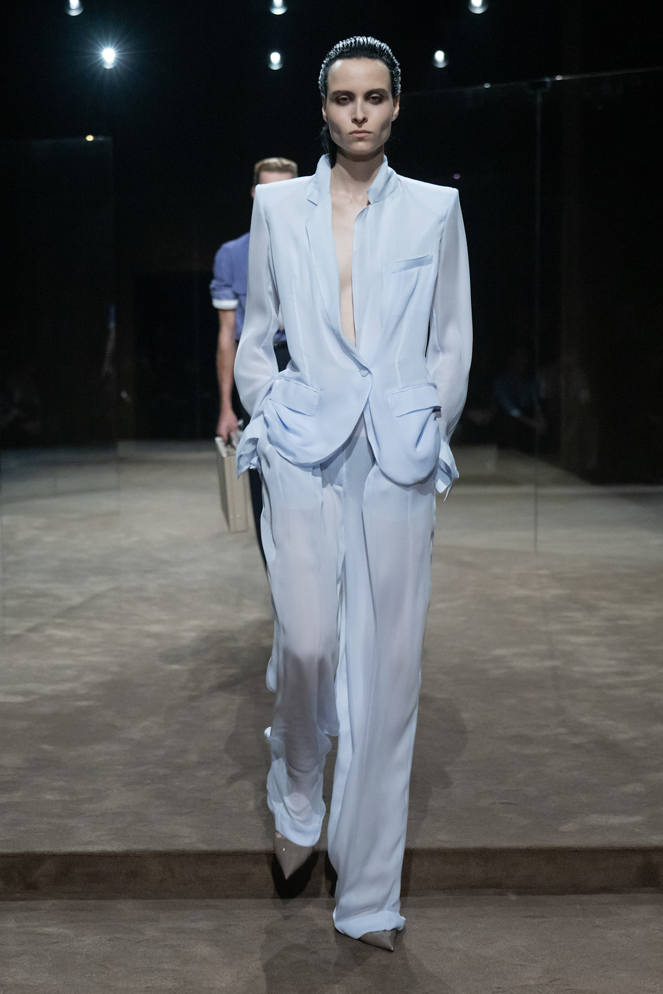 a model walks the tom ford runway show.